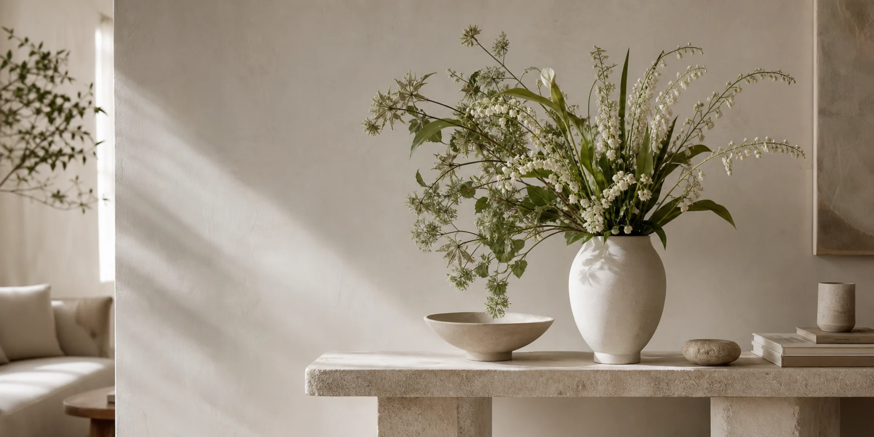 Artificial floral arrangement in a ceramic vase