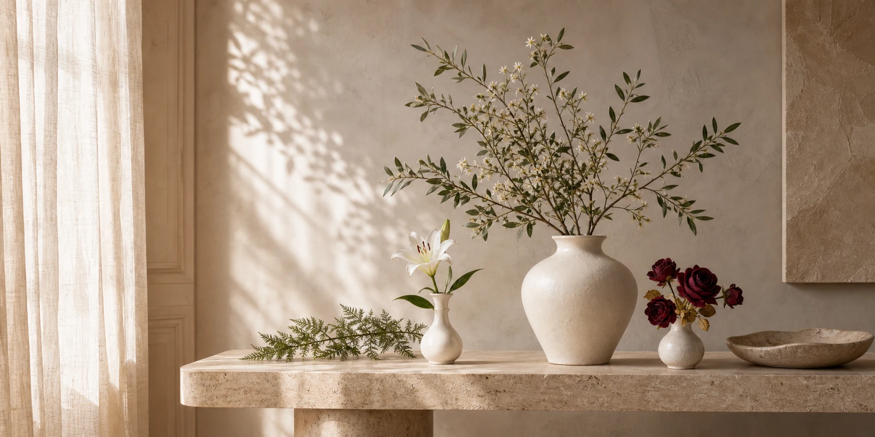 Artificial floral arrangement in a ceramic vase